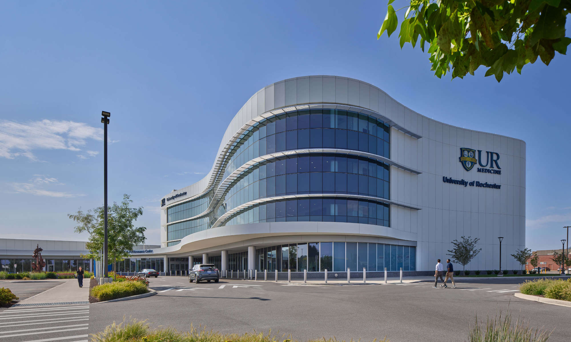 Exterior view of the UR Medicine Saunders Center for Orthopaedics and Physical Performance on a clear, sunny day.
