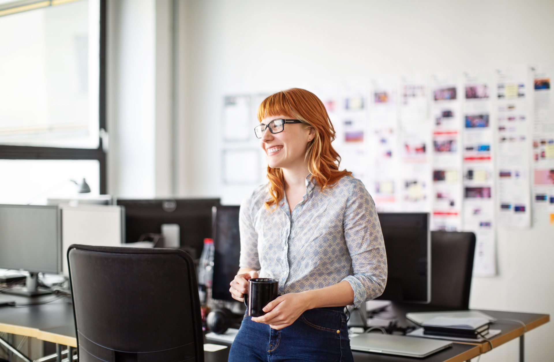 Businesswoman having a coffee break in office