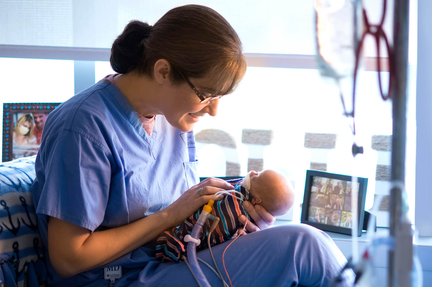 woman holding newborn baby