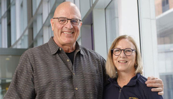 Bob Pizzutiello ’77, ’78 (MS) and Mabelle Pizzutiello ’63N, P’89 posing together for photo